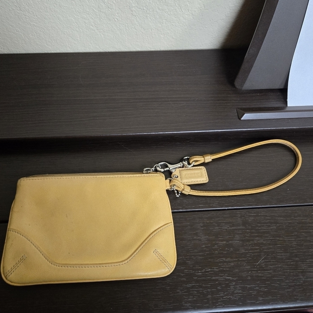 Coach yellow leather wristlet